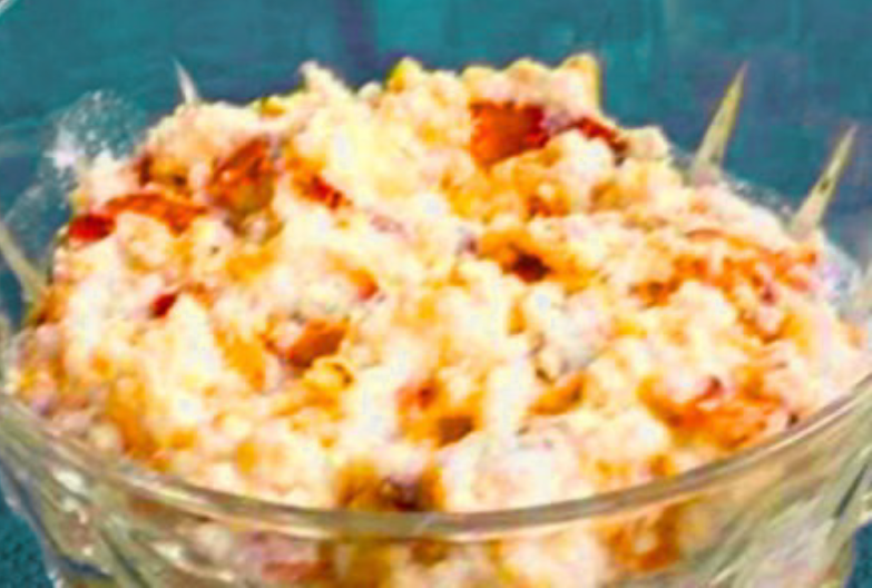 Cream delight with whiskey, sliced almonds and toasted oatmeal served chilled in a dessert glass