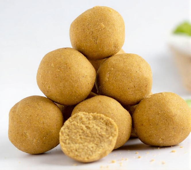 dakua groundnut and maize balls piled into a pyramid