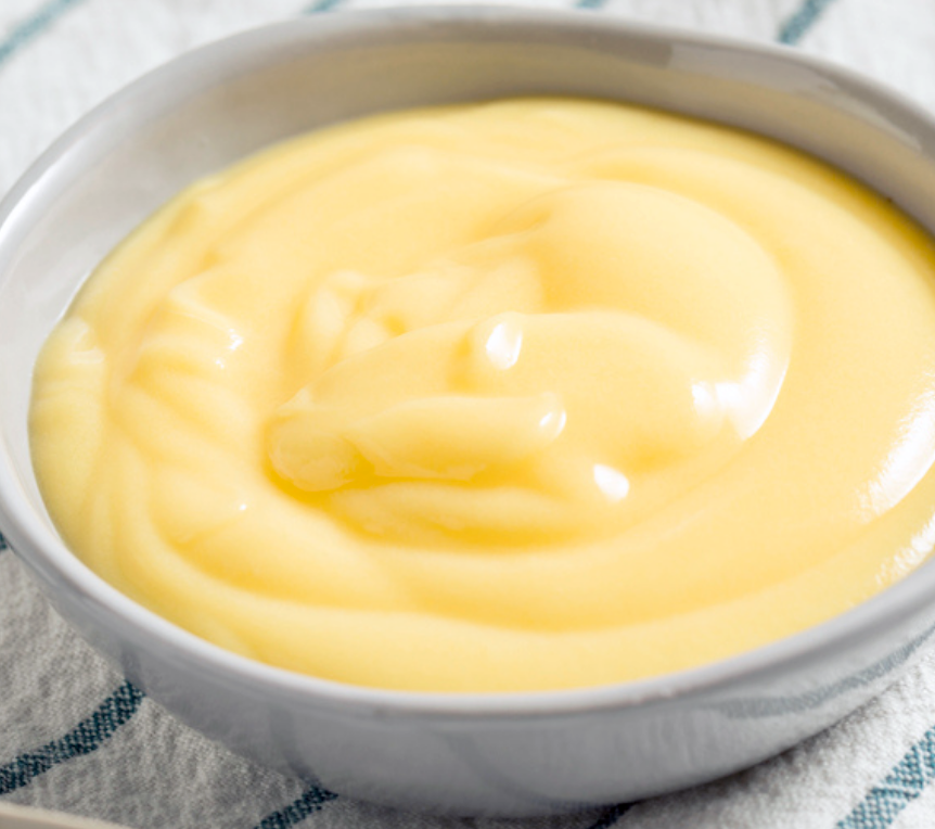 Egg custard served in an off-white dessert bowl