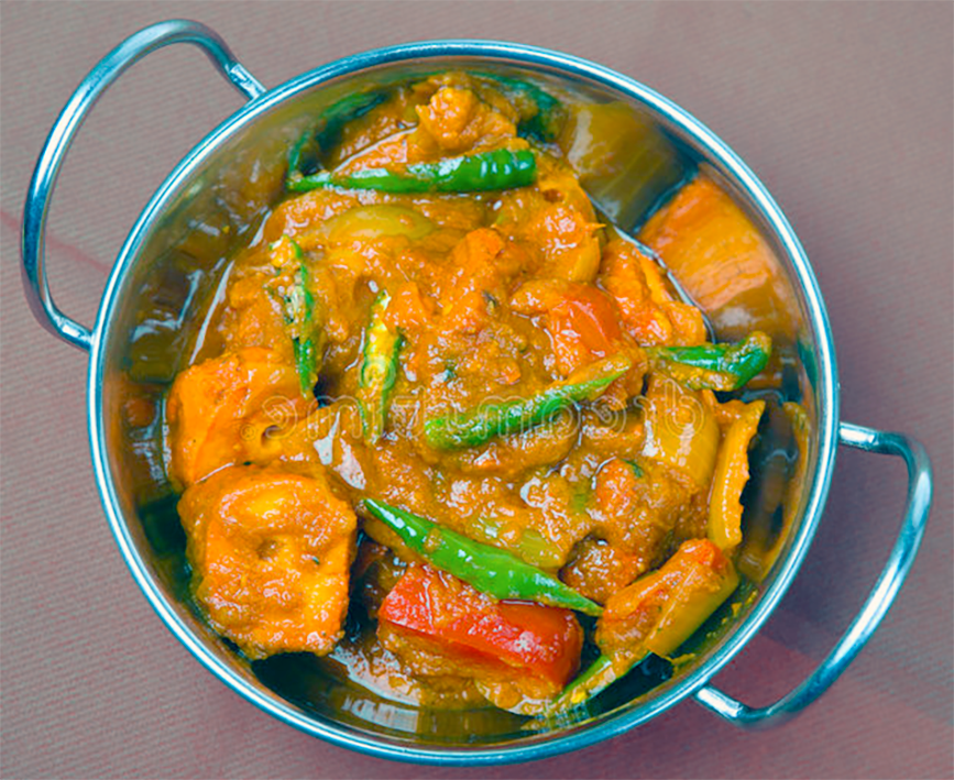 Lamb jalfrezi with extra green chillies served in a balti dish
