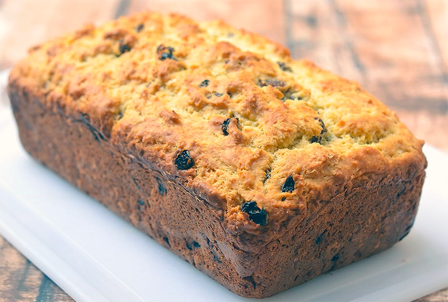 Irish farmhouse loaf sodabread on a white plastic chopping board