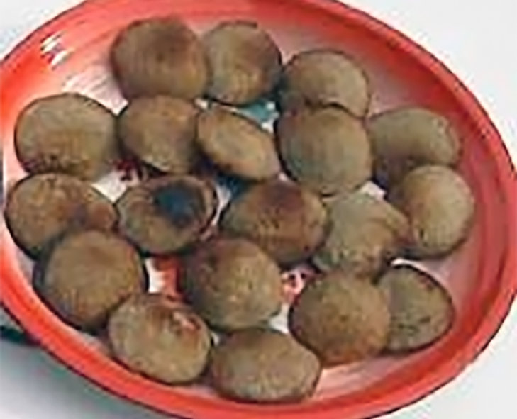 fonio fritters served in an earthenware bowl