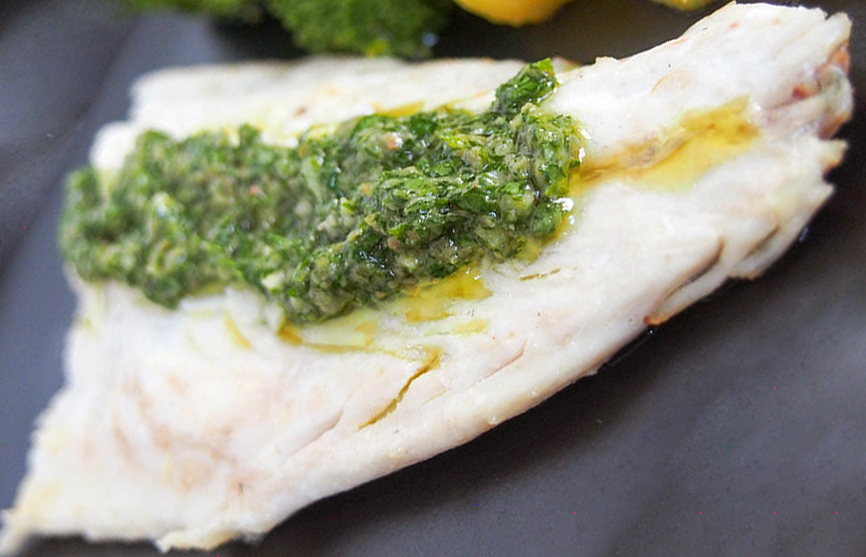Fillet of white fish topped with green herb sauce