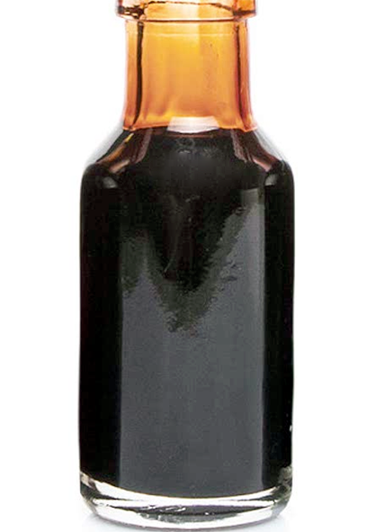 brown food colouring in a small smoked glass bottle