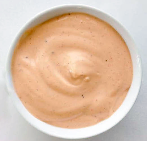 Pink cardinal sauce in a glass bowl