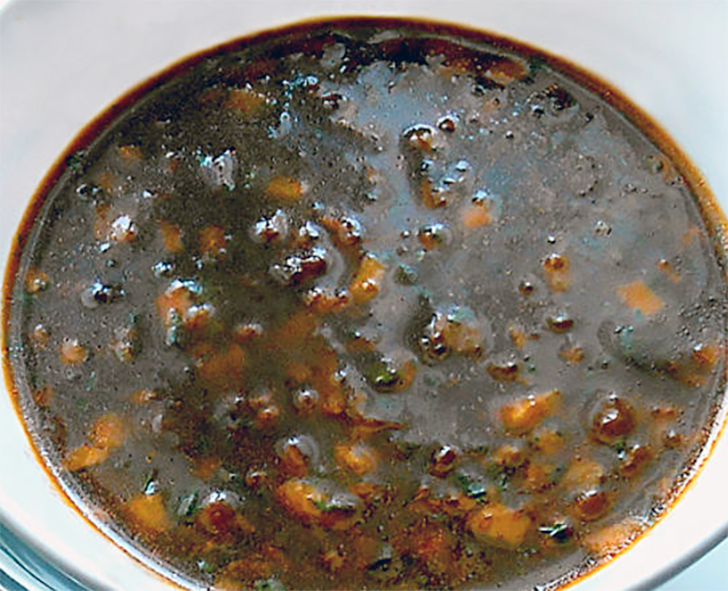 sauce Duxelles presented in a white bowl