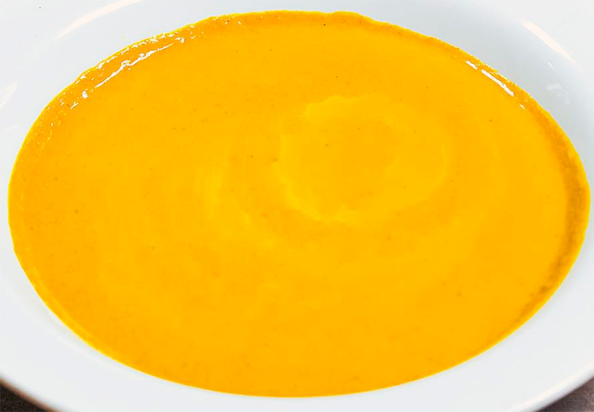 vegetarian gbegiri stew served in a white bowl