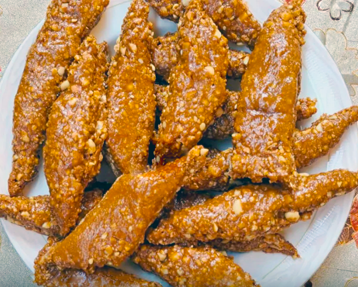 Sierra Leonean sugar and peanut sweet snacks piled on a plate