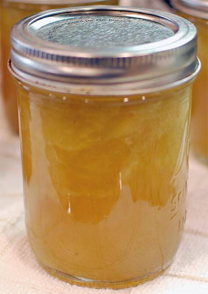 sealed jam jar of green grape jelly