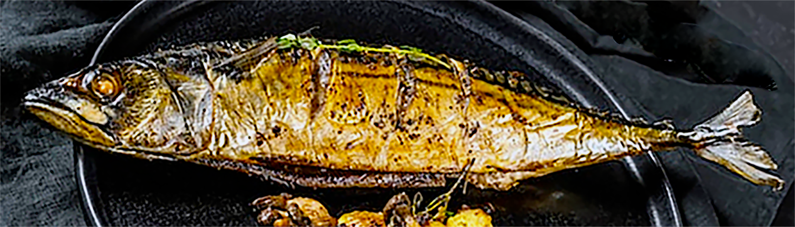 Chinese-style barbecued mackerel on a plate