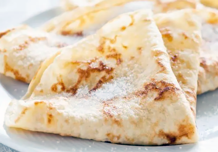 hazelnut pancake served folded on a plate