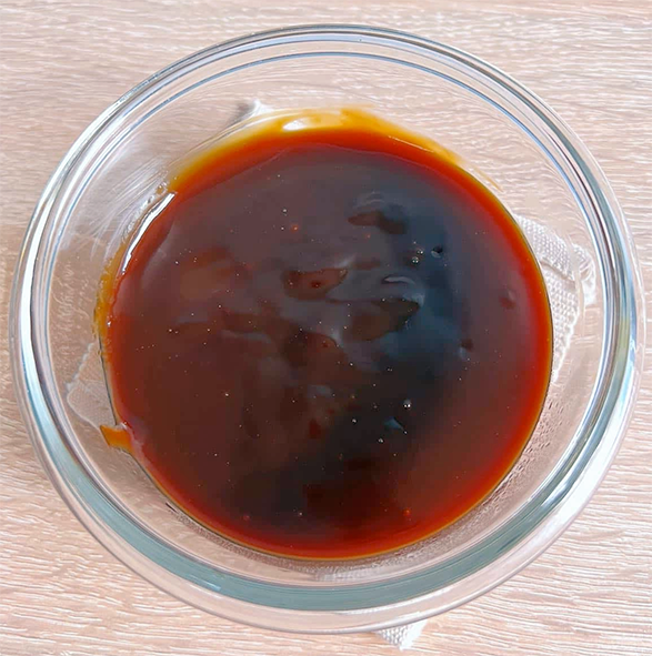 home-made oyster sauce in a glass bowl