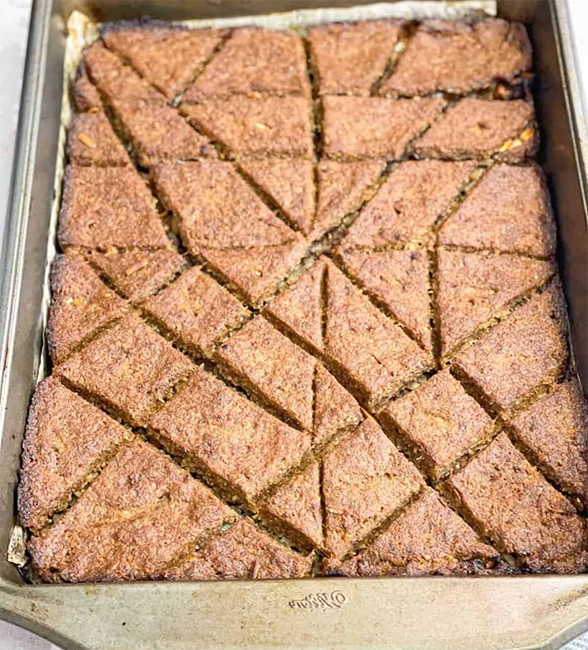 kibbe mixture baked in a lined baking tin and stored with an attractive pattern