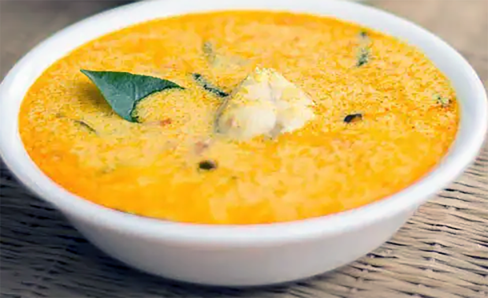 Keralan fish curry served in a white bowl</a>