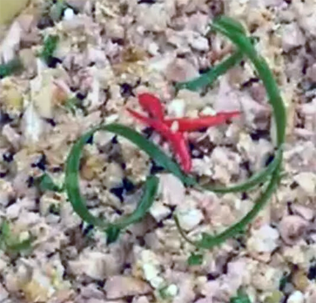Chicken kelaguen served in a bowl