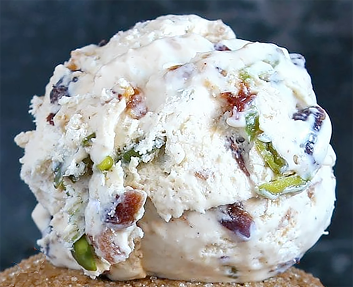 scoop of mincemeat ice cream presented on a glazed sugar bun