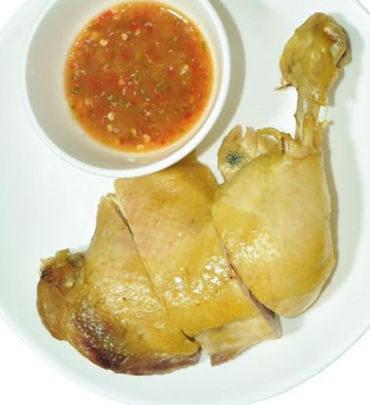 boiled chicken leg served with a sauce made from the chillies with which its cooked