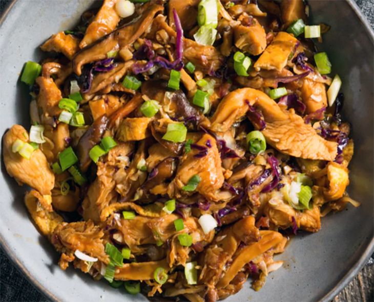 moo shu pork served in a blue bowl