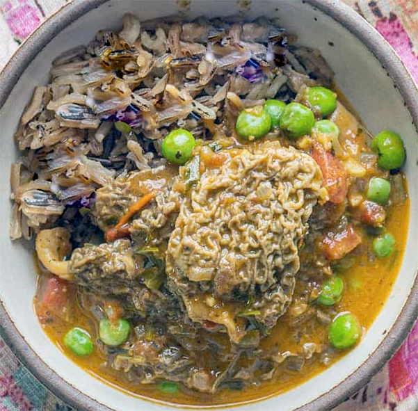 Morel mattar masala served in a bowl with rice