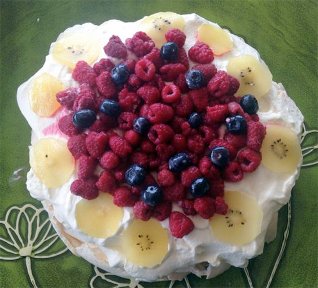 New Zealand Christmas pavlova served with a mixed fruit topping