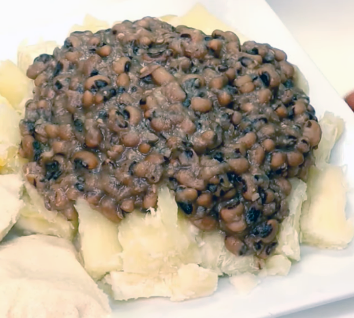 stewed black-eyed beans served on a bed of cassava