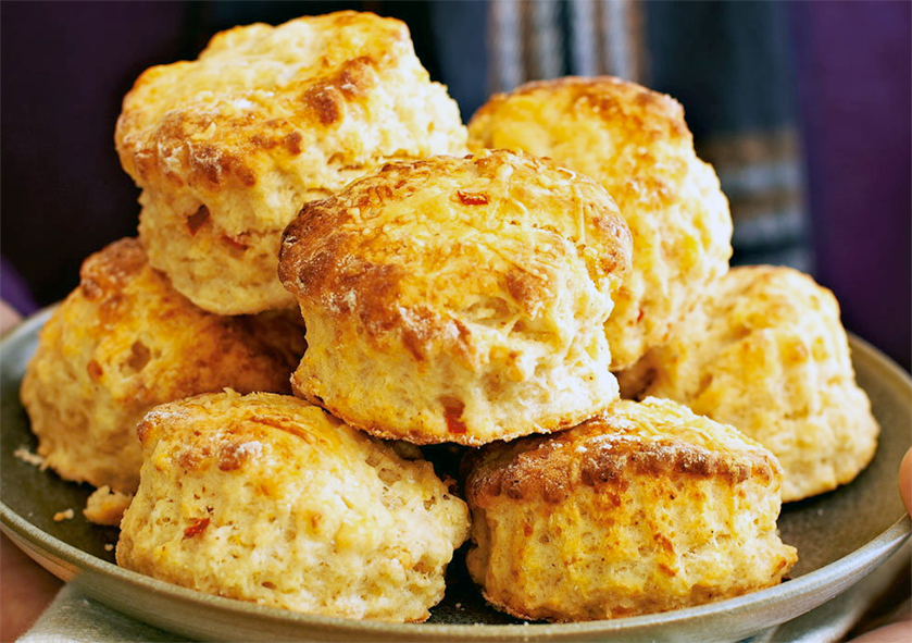cheese scones piled on a plate