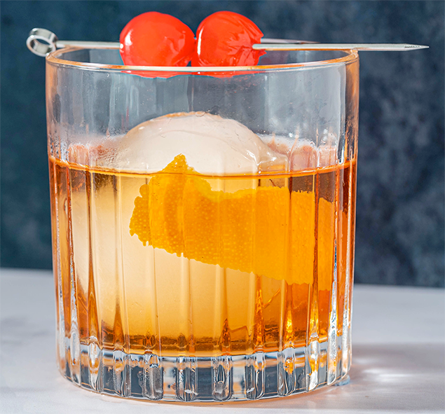 old fashioned cocktail in an old fashioned 'tumbler' glass.