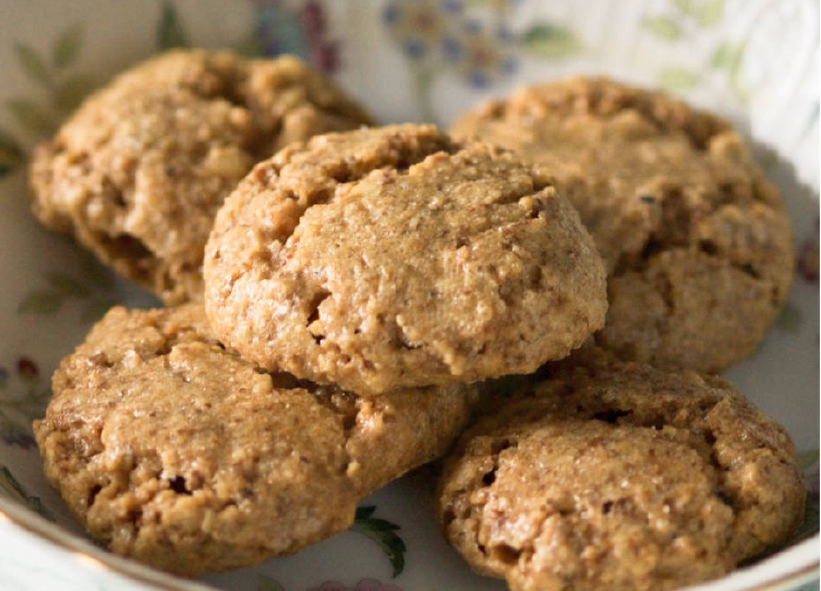 five Croatian walnut biscuits piled on a plate
