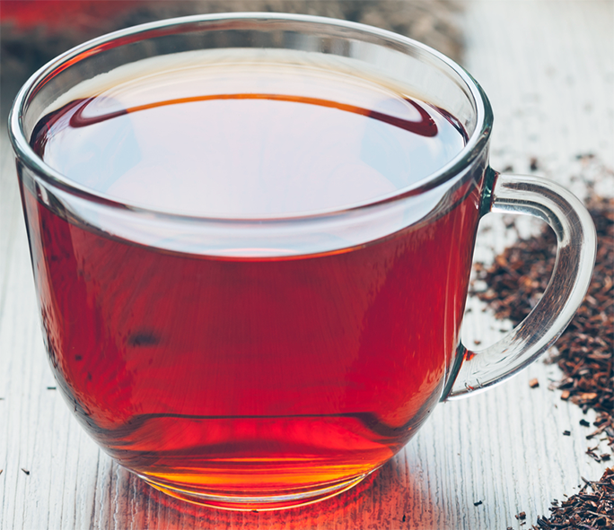 spiced rooibos chai tea in a glass cup