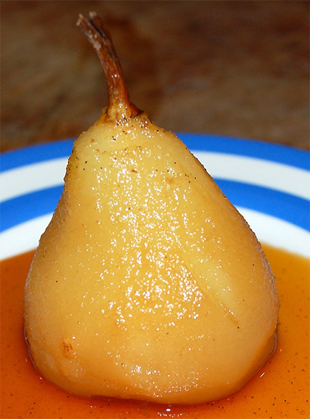 rooibos poached pear on a bed of syrup