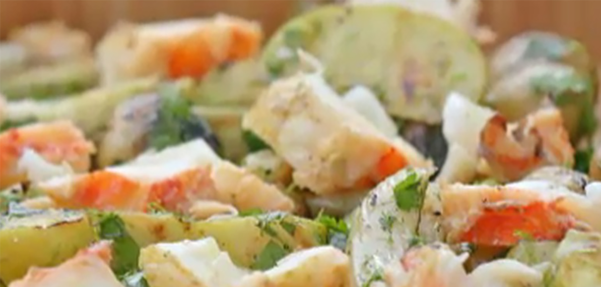 Cape Verdean lobster salad of dressed lobster served on a bed of egg and sweet potatoes
