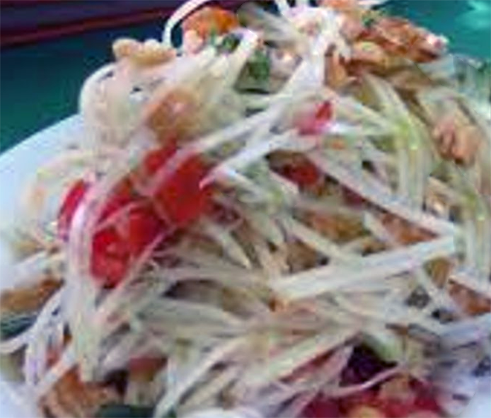 green papaya and tomato salad served topped with peanuts