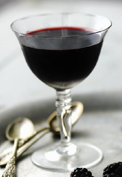 blackberry and sloe gin jelly served in a dessert glass