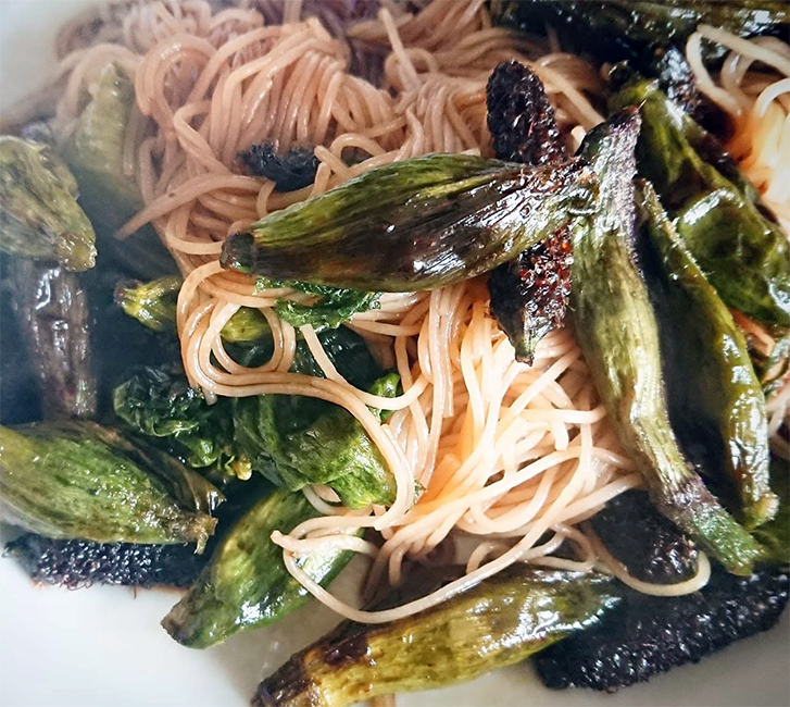 Stir-fry of noodles with common hogweed flower buds and ribwort plantain flower buds in sweet soy sauce