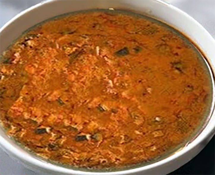 baked tomato-based Mauritian terrine in a white dish