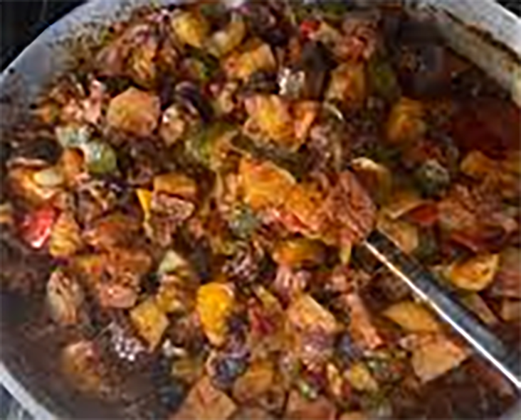 turlu stew cooking in a wok