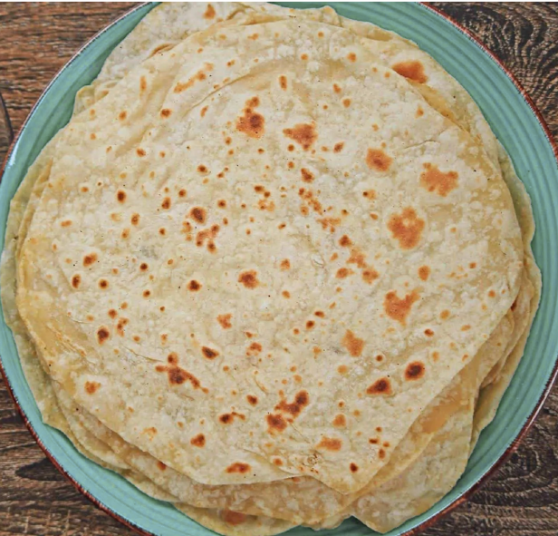 yufka, unleavened Turkish flatbread piled on a blue-green plate
