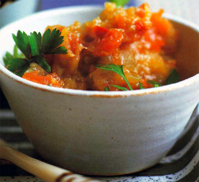 zahlouk salad of aubergines and tomatoes flavoured with argan oil and harissa shown served in a conical bowl